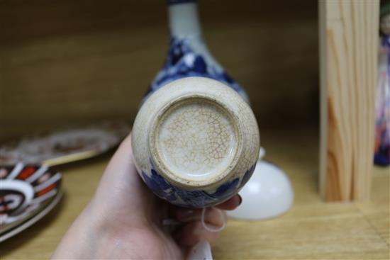 An 18th century blue and white guglet and a Guangxu brushwasher and a small crackle vase